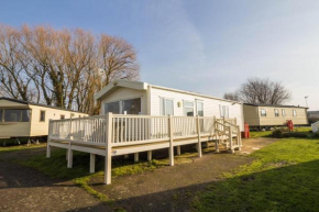 Caravan with decking WiFi at Coopers Beach Holiday Park ref 49012CW
